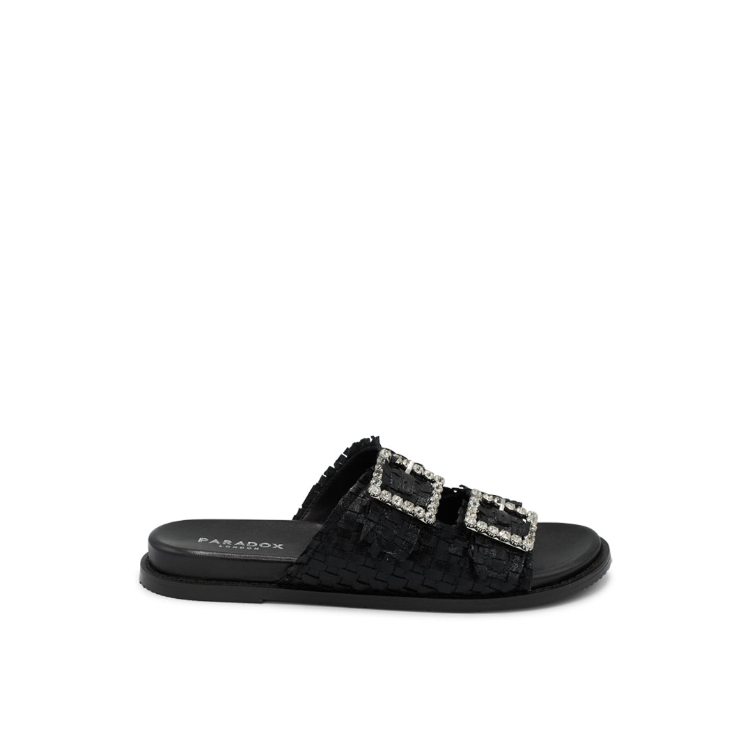 Black flat sandals by Paradox London